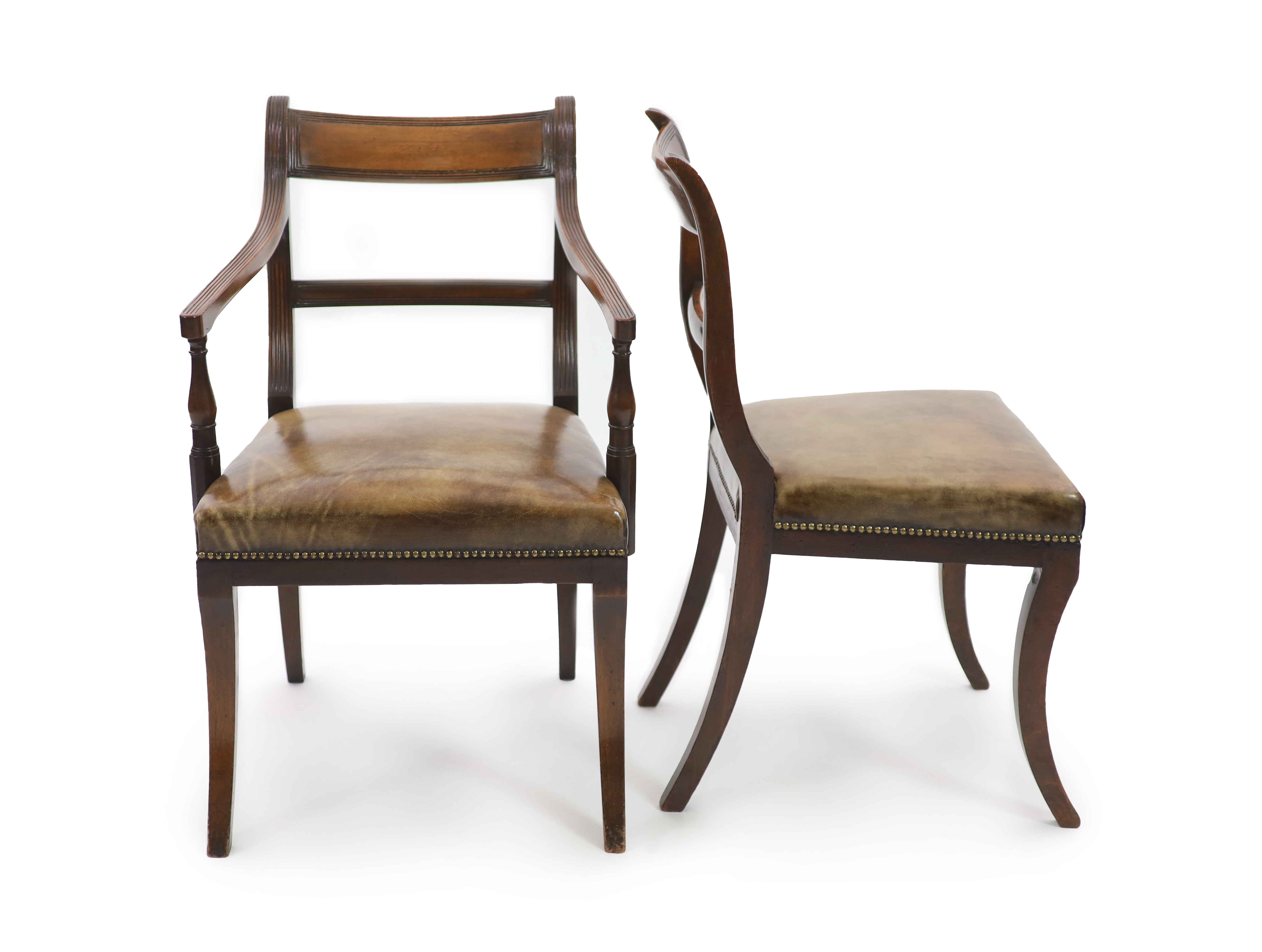 A set of fourteen Regency and later mahogany dining chairs, including two carvers, carvers W.58cm H.89cm